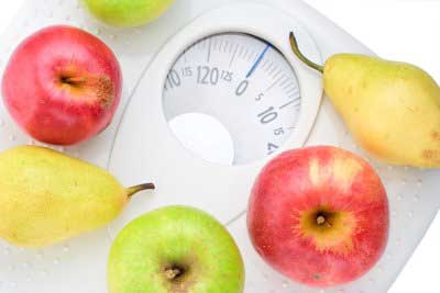 Fruits kept on the weighing machine